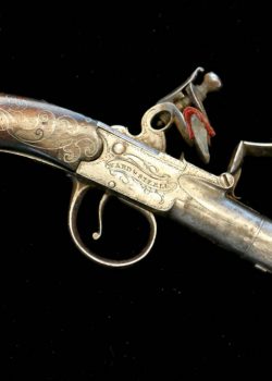 An ornate Queen Anne flintlock pistol is one of a pari stolen from Valley Forge Historical Society on Oct. 31, 1970. (Emma Lee/WHYY)